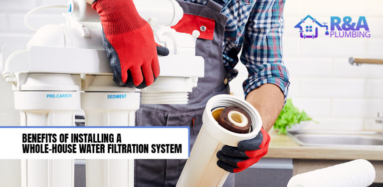 R&A plumbing technician is installing a whole-house water filtration system.